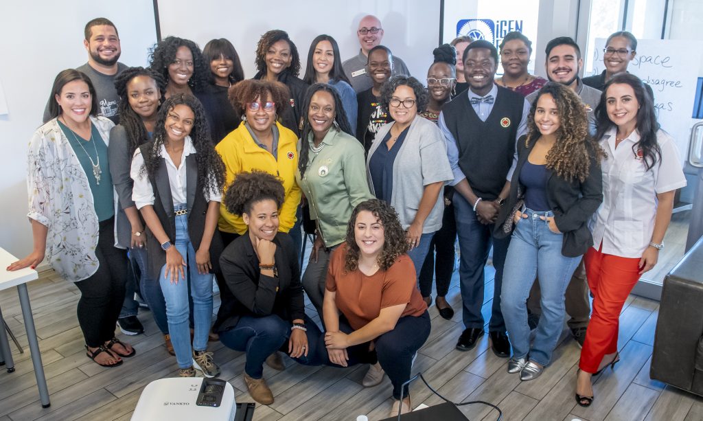 Melanated Pearl Founder with a diverse group of leaders from City Year Miami. Group photo following a PD session. 